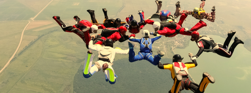 Yellow Parachute Team Skydivers Picture